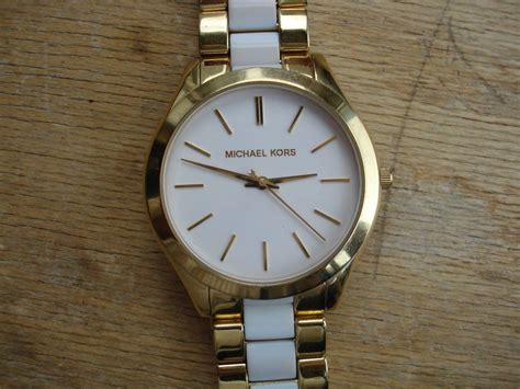 michael kors gold weiss|michael kors pre owned.